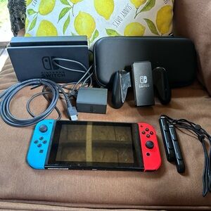 Nintendo Switch Console with Red and Blue Joy-Con